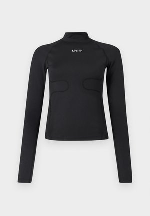 Zwarte aangesloten longsleeve top met een opstaande kraag en het witte "LeGer" logo gecentreerd op de borst tegen een witte achtergrond.
