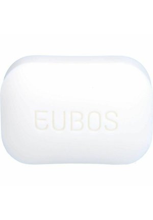 Oblong white soap bar with rounded edges, featuring an embossed "EUBOS" brand logo on one side. Smooth texture with a glossy finish.