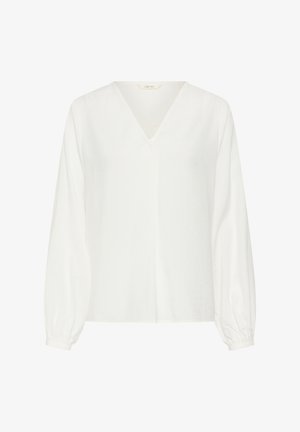 Bijela bluza s dugim rukavima, V-izrezom, opuštenog kroja i nabranim elastičnim manšetama, izrađena od laganog materijala.
