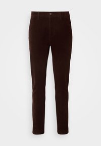 Bruna kordfläsk chinos med slim fit, med knäppning, bälteshällor och subtil struktur från ribbad tyg.