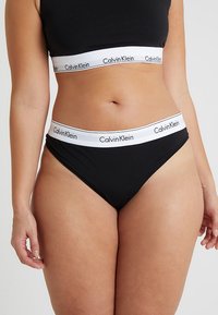 Calvin Klein Underwear - MODERN PLUS THONG - Perizoma - black Immagine in miniatura 1