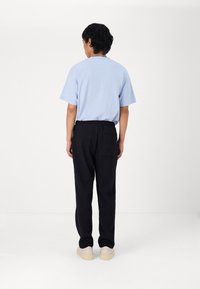 Jack & Jones JPSTKANE JJRICK  - Donji dijelovi trenirke - black