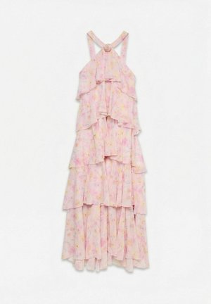 Robe maxi à volants pastel à fleurs, à volants, avec fines bretelles croisées et un détail de rose en tissu au niveau de l'encolure.