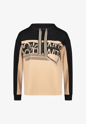 Color-blocket sweatshirt i beige og sort med høj hals, snørejustering og grafiske printdetaljer. Glat tekstur.