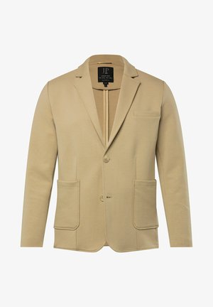 Beżowa marynarka wykonana z miękkiego materiału, z wyciętym kołnierzykiem, dwoma przednimi kieszeniami i zapięciem na jeden guzik. Minimalistyczny design z czystymi liniami.