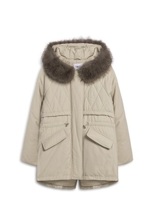 Beige gewatteerde jas met een gestikt patroon, voorzien van een bruine faux bont kraag, twee voortassen en een ritssluiting. Over het algemeen een gladde textuur.