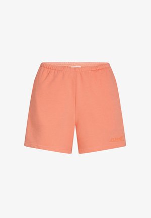 Perzikkleurige shorts van zacht materiaal, met een elastische tailleband en een klein geborduurd logo aan de voorkant. Glad textuur, eenvoudig ontwerp.
