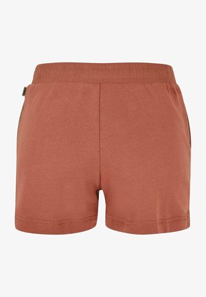 Ruosteisen oranssit shortsit, jotka on valmistettu pehmeästä puuvillasta, ja niissä on joustava vyötärö, yksinkertainen muotoilu. Ei taskuja tai lisäkoristeluja.