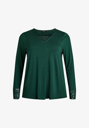 Green long-sleeve top with a V-neckline, featuring lace accents at the cuffs and a flowing design. Made from soft, smooth fabric.