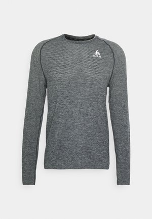 Langarmshirt in donkergrijs, met een gestructureerde stof en een ronde hals. Heeft contrasterende naden en een klein wit logo op de borst.