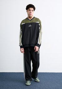 adidas Originals Tracksuit bottoms - black