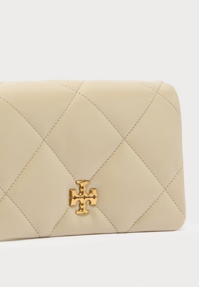 Beige quilted leather wallet with a rectangular shape, featuring diagonal stitching and a gold-tone logo accent on the front.