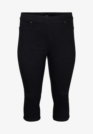 Leggings negros hasta la rodilla hechos de un tejido elástico. Presentan una amplia cinturilla elástica y bolsillos delanteros con pequeños acentos metálicos.