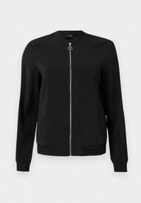 Veste bomber noire avec un col rond, une fermeture éclair avant et des poignets côtelés. Tissu doux avec poches latérales, sans motifs ni ornements visibles.