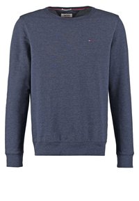 Námořnická modrá mikina s dlouhým rukávem a kulatým výstřihem, s žebrovanými manžetami a lemem, na hrudi má malou vlajkovou nálepku Tommy Hilfiger.