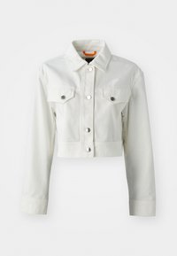 White cropped denim jacket with metallic buttons, two chest pockets, and a classic collar. Smooth texture and tailored fit.