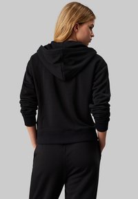Calvin Klein Performance HALF ZIP  - Felpa con cappuccio - black beauty