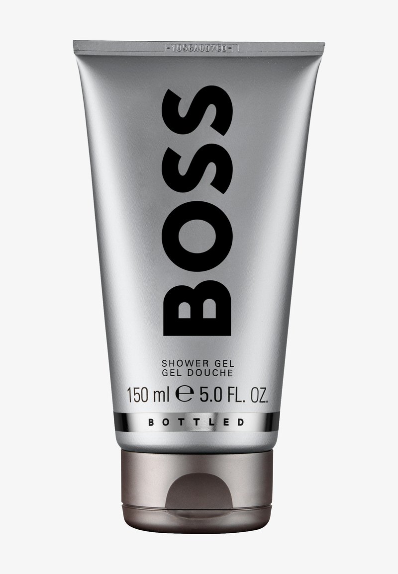 Silberne Tube BOSS Bottled Duschgel, 150 ml, mit schwarzem Text und grauem Klappverschluss.