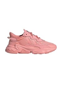 Sneaker rosa con materiali in mesh e sintetici, punta arrotondata, suola testurizzata e dettagli unici a onde sulla suola intermedia.