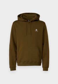 Sudadera con capucha marrón hecha de una suave mezcla de algodón, que presenta un bolsillo delantero y un pequeño logo blanco de Converse en el pecho.