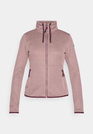 Tett, jakke med glidelås i rosa med skrå stripe tekstur. Har høy krage, to sidelommer og mørk lilla detaljer på glidelåsen.