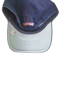 Navy blue baseball cap with a light gray brim, featuring red "BOSTON" lettering inside and a baseball graphic sticker on the brim.