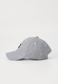 Striped baseball cap in black and white fabric, featuring a curved brim, structured crown, and a small logo patch on the front.
