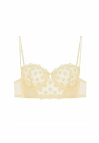 Jasnożółty koronkowy stanik z kwiatowym haftem, z fiszbinami, małym detalem w postaci otworu na środku, regulowanymi ramiączkami i falbaniastymi brzegami.