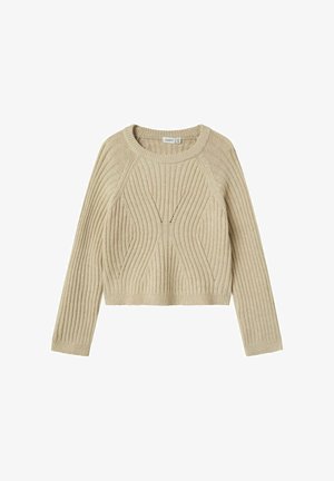 Pull cropped beige avec texture côtelée, col rond et manches longues. Présente un motif ondulé et de délicats détails en œillets.