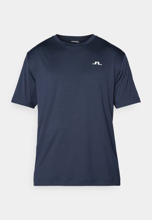 Lietussargu zila īsām piedurknēm T-kreklu, izgatavotu no gludas, vieglas auduma. Ar baltu logotipu uz krūtīm un apaļu kakla izgriezumu.