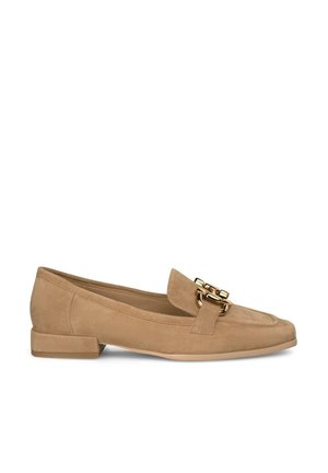 Beige suede loafer with a flat heel, featuring a gold chain accent on the upper. Smooth texture and classic design with rounded toe.