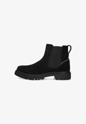 Zwarte suède enkelboots met elastische zijkanten, een gestructureerde rubberen zool, een trekhaak en een gestroomlijnd ontwerp dat geschikt is voor verschillende gelegenheden.