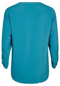 Türkises Langarmshirt mit entspannter Passform, rundem Ausschnitt und gerafften Details an den Ärmeln. Glattes Gewebe mit einem subtilen Glanz.