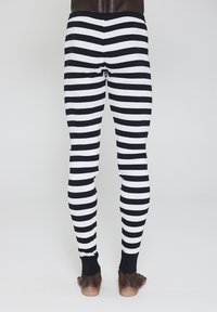 Klassiske sort og hvidstribede leggins med et tæt design. Fremstillet af blødt stof og med ribbet talje og ankler.