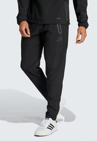 adidas Performance TIRO 25 PRO VIS TECH TRAVEL PANTS - Tréningruha alsók - black