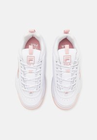White and light pink sneakers with a textured leather upper, lace closure, padded collar, and logo accents on the tongue and side.