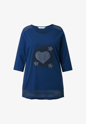 Navy blue long-sleeve T-shirt featuring a heart and star design in rhinestones, textured shoulder accents, and a slightly curved hemline.