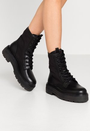 Bottines à plateau - black