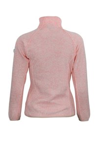 Veste en polaire de couleur rose doux avec une finition texturée, col haut et manches longues. Présente des manches raglan et un petit logo de marque sur l'épaule.