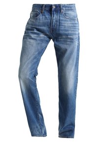 Světle modré džíny z denimu s přímým střihem, jemným vyblednutím, pět kapsami a kovovým knoflíkem na pase.