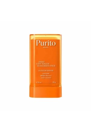 Stick solaire Purito Daily Soft Touch dans un emballage orange vif, SPF50+ PA++++, résistant à l'eau, 20 g pour la protection solaire en extérieur.