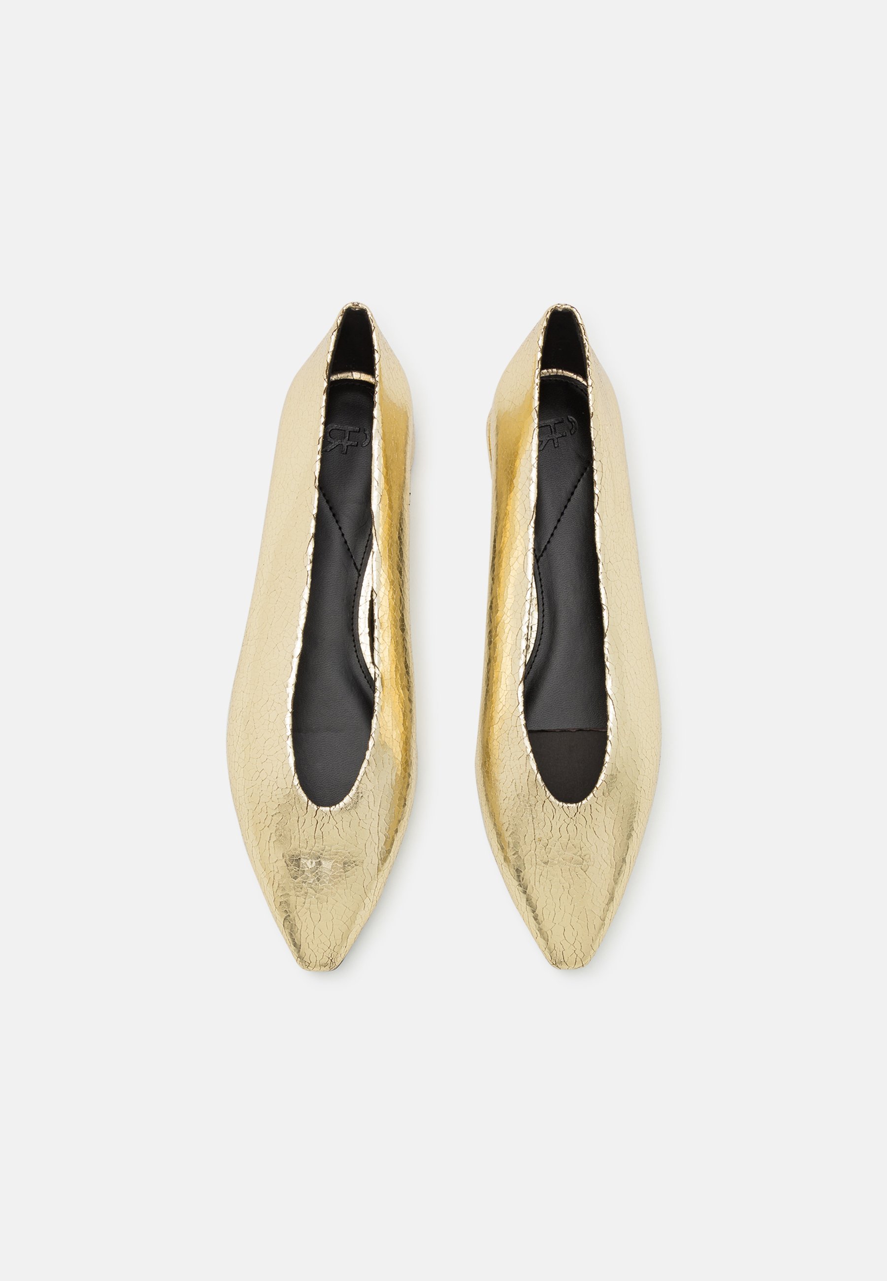 white and gold flats