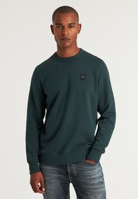 CHASIN' TOBY - Sportska majica - dark green