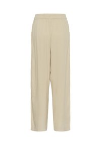Pantalons en lin beige, amples, avec une taille élastique et des jambes droites. Caractéristiques : texture douce, sans fermetures visibles ni poches.