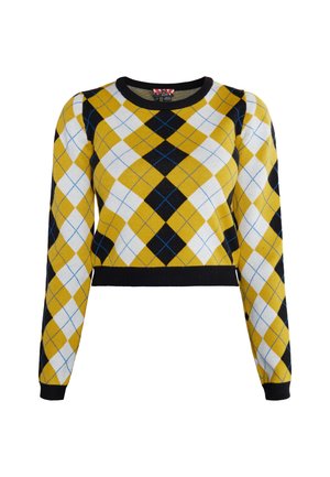 Kollane, must ja valge ruuduline pika varrukaga sviiter, millel on must ümar kaelus, mansetid ja vöökoht.