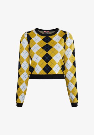 Kollane, must ja valge ruuduline pika varrukaga sviiter, millel on must ümar kaelus, mansetid ja vöökoht.