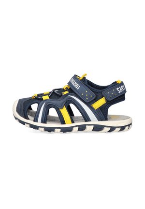 Sandalía deportiva infantil en azul y amarillo con tirantes ajustables y suela acolchada, diseñada para actividades al aire libre.