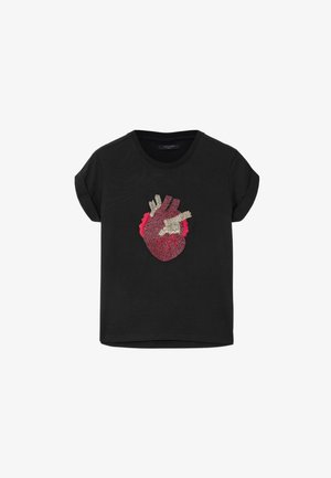 Black short-sleeve t-shirt with rolled cuffs featuring a detailed anatomical heart graphic in red and beige at the center front.