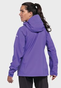 Purple waterproof jacket with a hood, featuring a textured surface and adjustable cuffs. The design includes a subtle grid pattern.