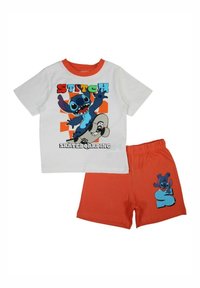 Ensemble pour enfants composé d'un T-shirt blanc avec un graphique coloré de Stitch et d'un short orange avec un design de cartoon assorti.
